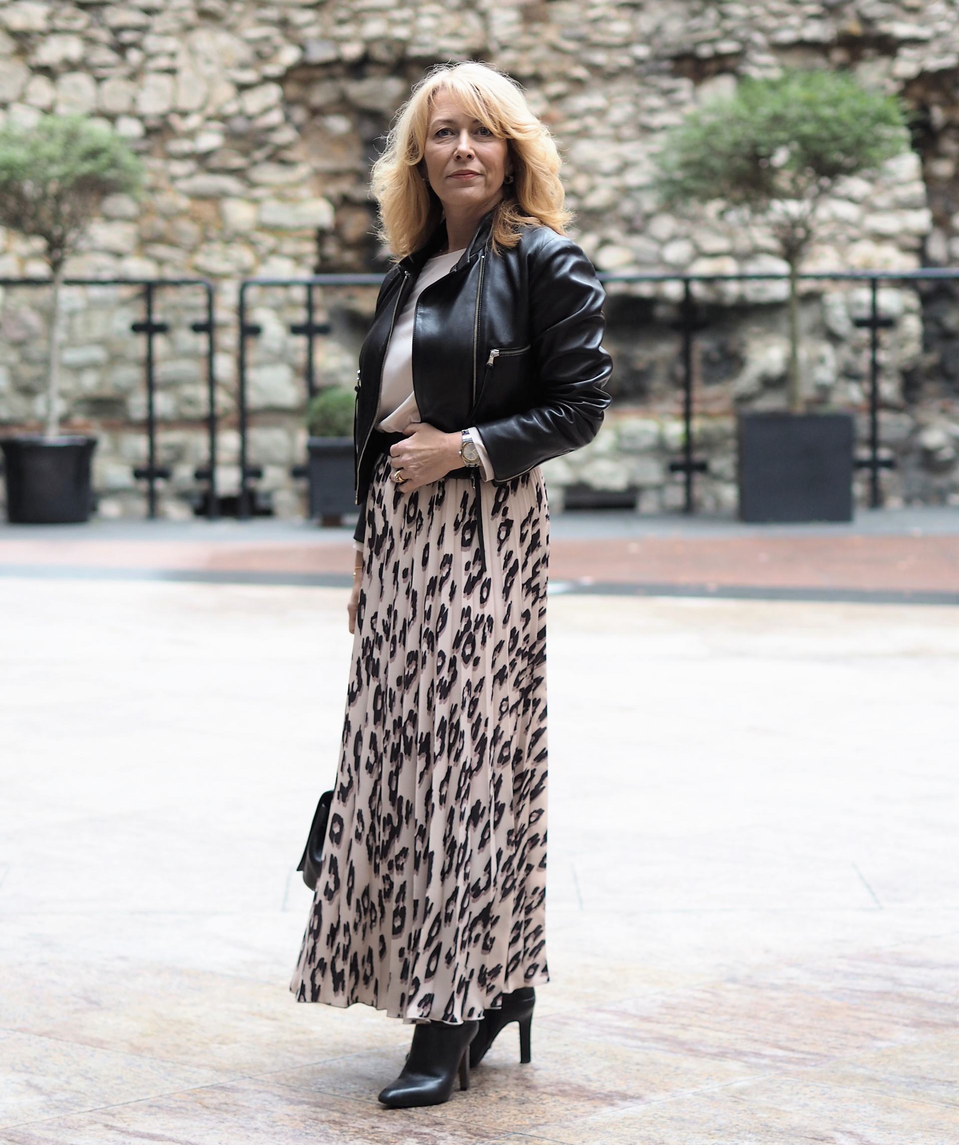 pleated skirt leather jacket